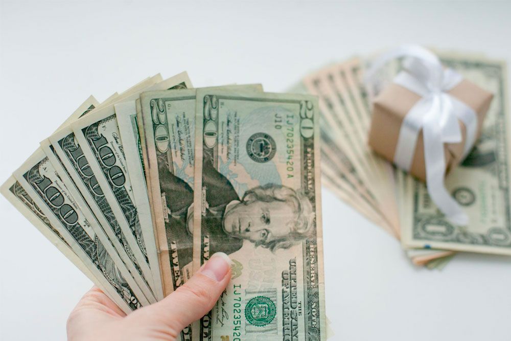 Hand Holding Money