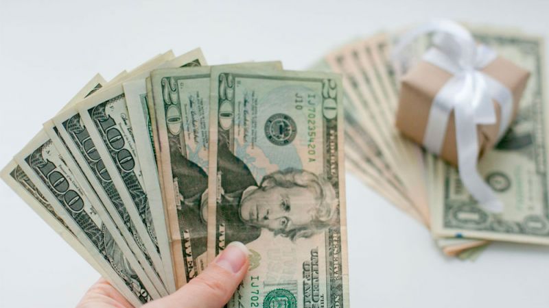 Hand Holding Money